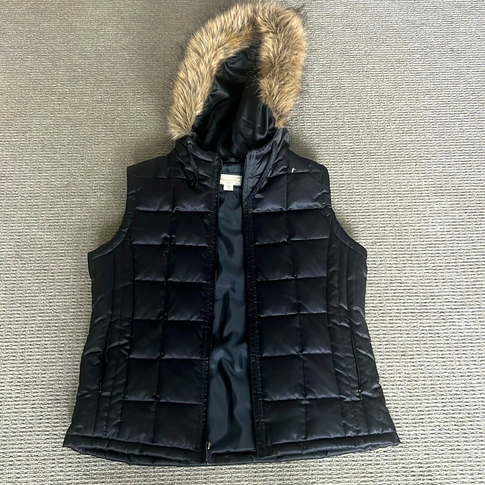 Ski-luxe! Thin flattering puffer vest with faux fur lined hood.